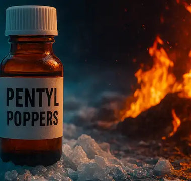 A small brown bottle labeled "PENTYL POPPERS" stands on ice, flames blazing in the background—raising the question: do pentyl poppers expire even when kept so cold?.